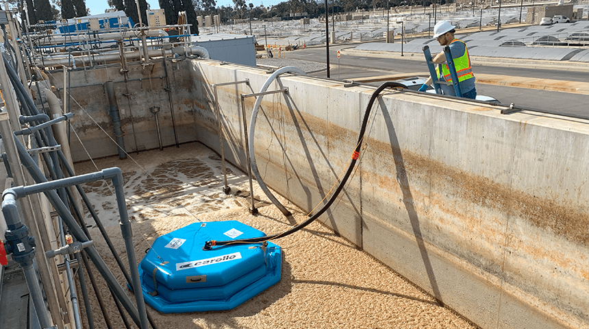 photo of a blue I-FLOAT off-gas tester in an aeration tank at a wastewater treatment facility