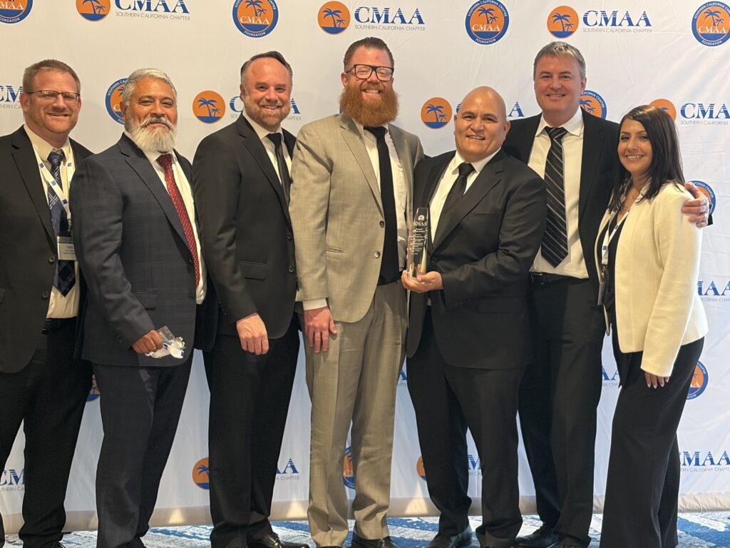 Photo of the Carollo employees and City of Oxford employees receiving a CMAA award for their gauge upgrade project. 