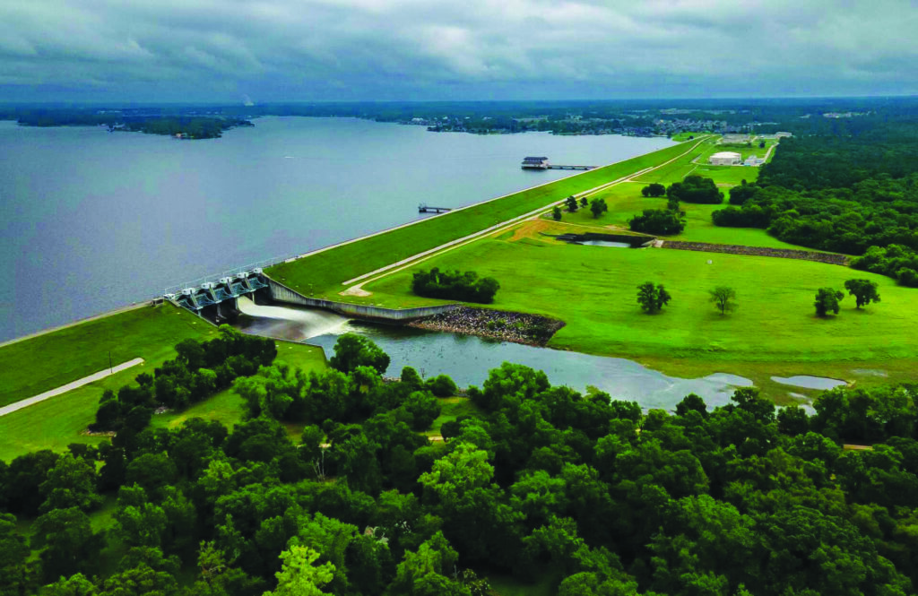 Aerial photo of a dam as part of San Jacinto River Authority and Carollo Engineers